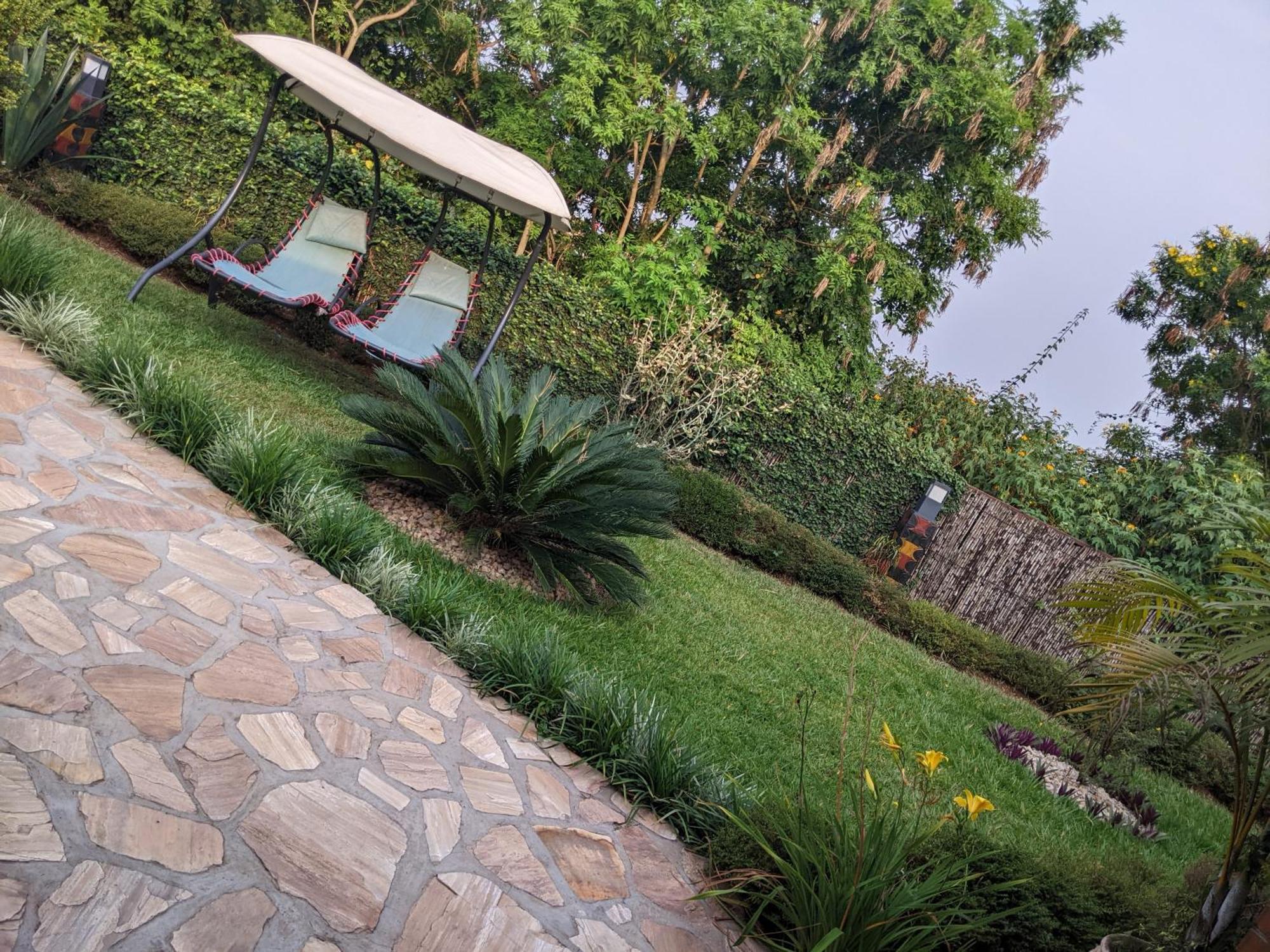 Inside Afrika Boutique Hotel Кигали Экстерьер фото